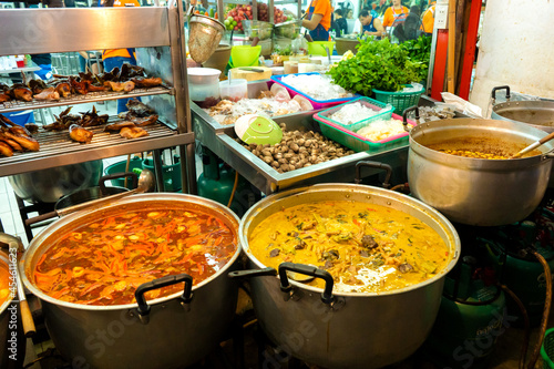 Soup casserole at an open-air street food market photo