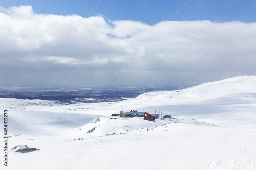 Winter view from the foot of the Avacha volcano on the building of the Ministry of Emergency Situations in the Natural Park Winter view from the foot of the Avacha volcano on the building of the Ministry of Emergency Situations in the Natural Park
