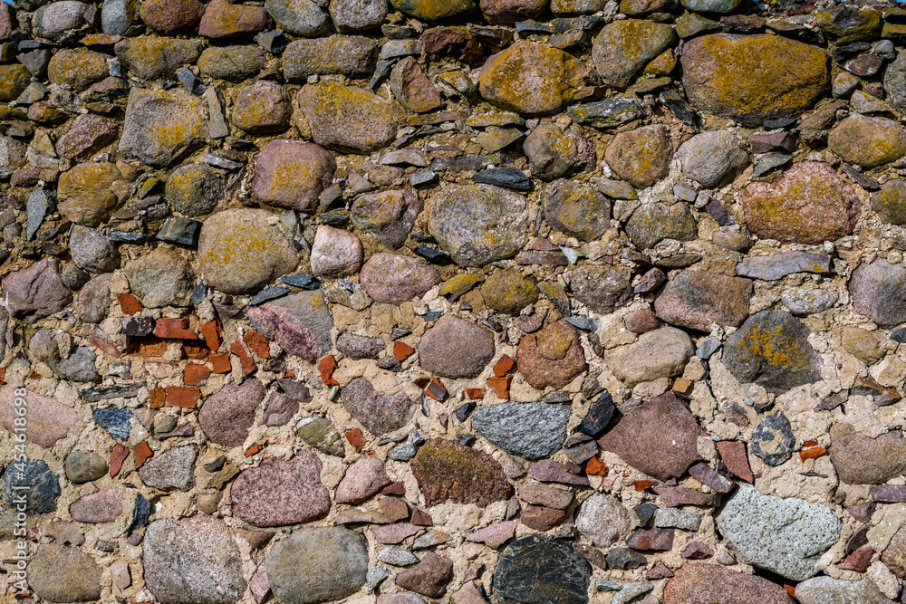surface of old wall of huge stones of a destroyed ancient building