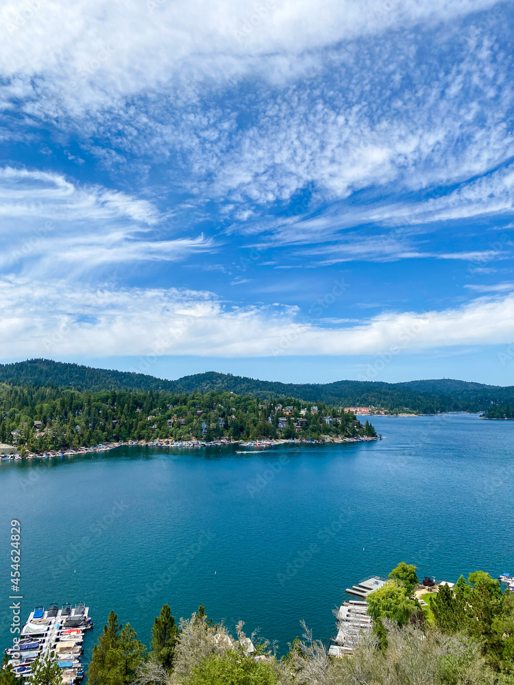Overhead view looking over Mountain Lake arrowhead Southern California with blue skies and cloudscape