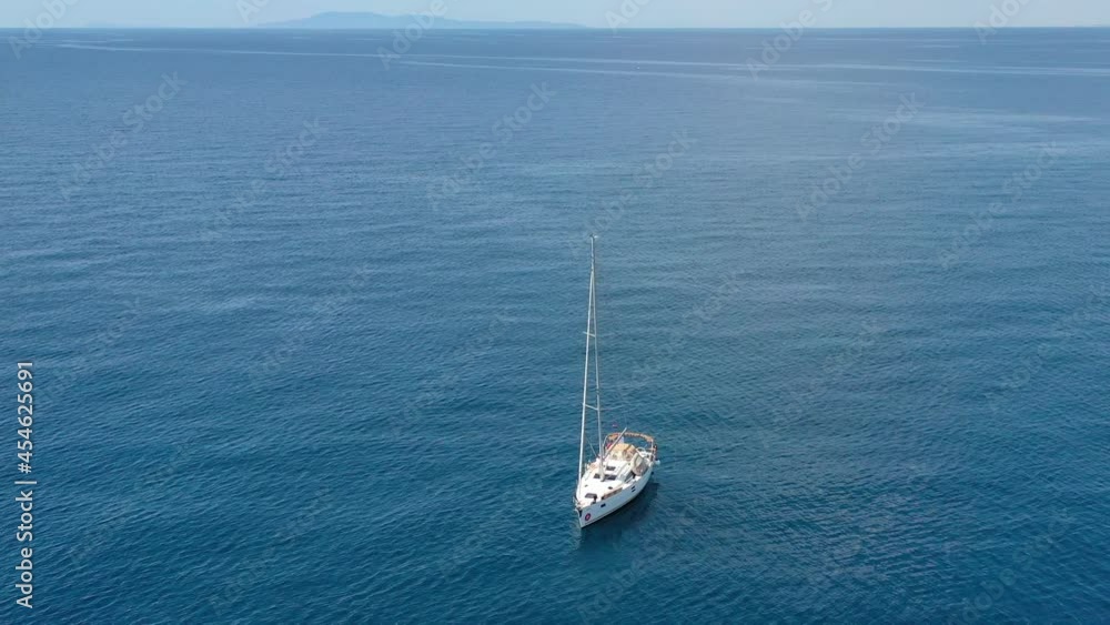 Aerial view of a sailboat in Adriatic sea near Croatia at summer day Aerial view of a sailboat in Adriatic sea near Croatia at summer day