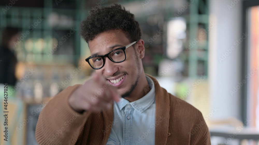 Portrait of African Man Pointing at Camera Portrait of African Man Pointing at Camera