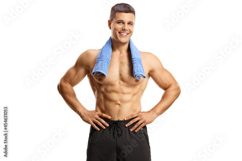 Shirtless muscular guy with a towel around his neck