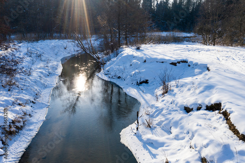 Wallpaper Mural Drone shot flying on forest and river in winter. Torontodigital.ca