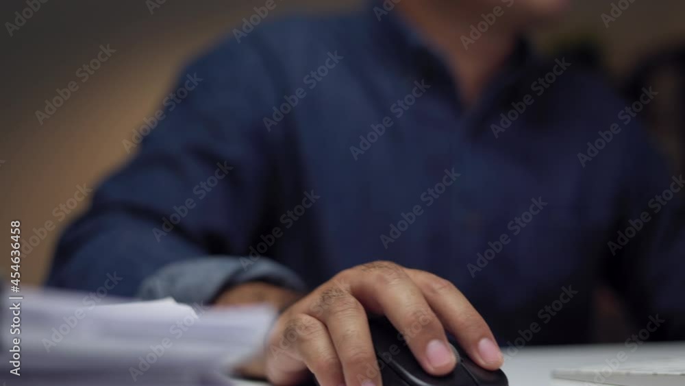 Young asian businessman working with computer in the dark office at night. Attractive Indian man work hard overtime in home with floor lamp ambient warm light late at night
Young asian businessman working with computer in the dark office at night. Attractive Indian man work hard overtime in home with floor lamp ambient warm light late at night