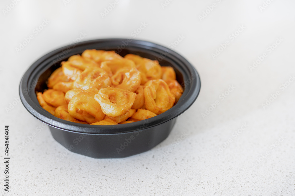 Tasty tortellini with tomato rosa sauce. Pasta time. Shallow depth of field. Tasty tortellini with tomato rosa sauce. Pasta time. Shallow depth of field.