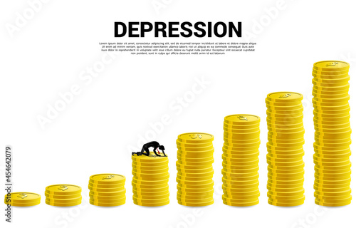 silhouette of businessman crawling on stack of coin. Concept for depression business in work.