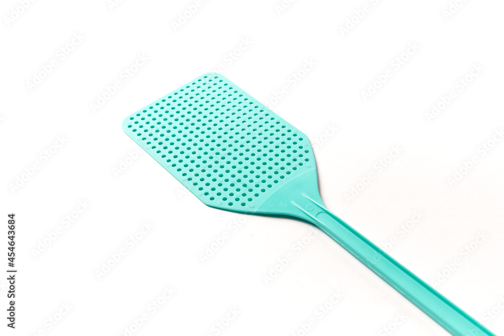 Plastic fly swatter isolated on white, plastic object used to kill a mosquito or any other bug. Also calles fly killer or pest control tool Plastic fly swatter isolated on white, plastic object used to kill a mosquito or any other bug. Also calles fly killer or pest control tool