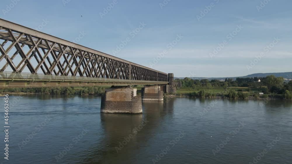 Flying beside and over the Truss-design Urmitzer Railway Bridge, Rhine river, Germany Flying beside and over the Truss-design Urmitzer Railway Bridge, Rhine river, Germany