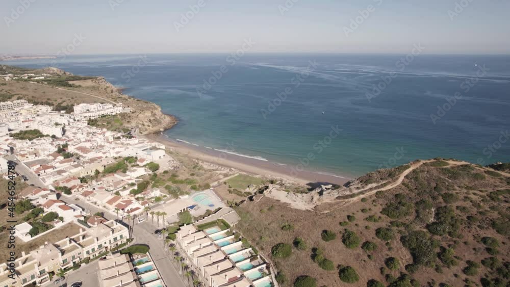 Seaside resort town of Burgau, Algarve. Beach holidays destination. Panoramic view Seaside resort town of Burgau, Algarve. Beach holidays destination. Panoramic view