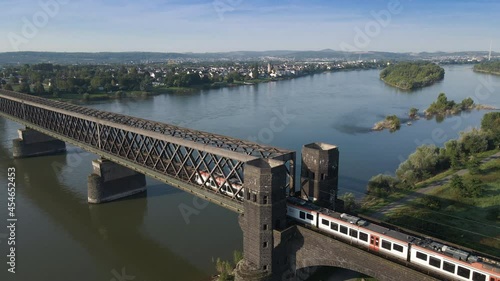 Train crossing Urmitzer Railway Bridge on the Rhine River, Germany photo