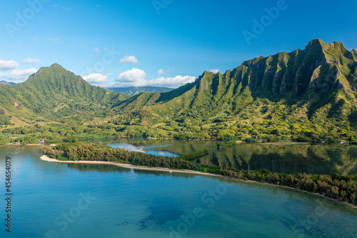 Aerial view of the ancient Moli'i fishponds with reflections of the Koolau mountains in the ponds. The ponds are located near Kaneohe, on the island of Oahu, Hawaii, USA.