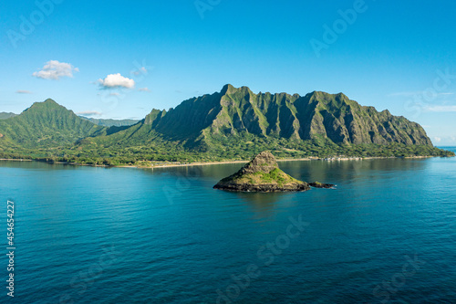 Mokoli'i island in Oahu, Hawaii, with the Ko'olau mountain range