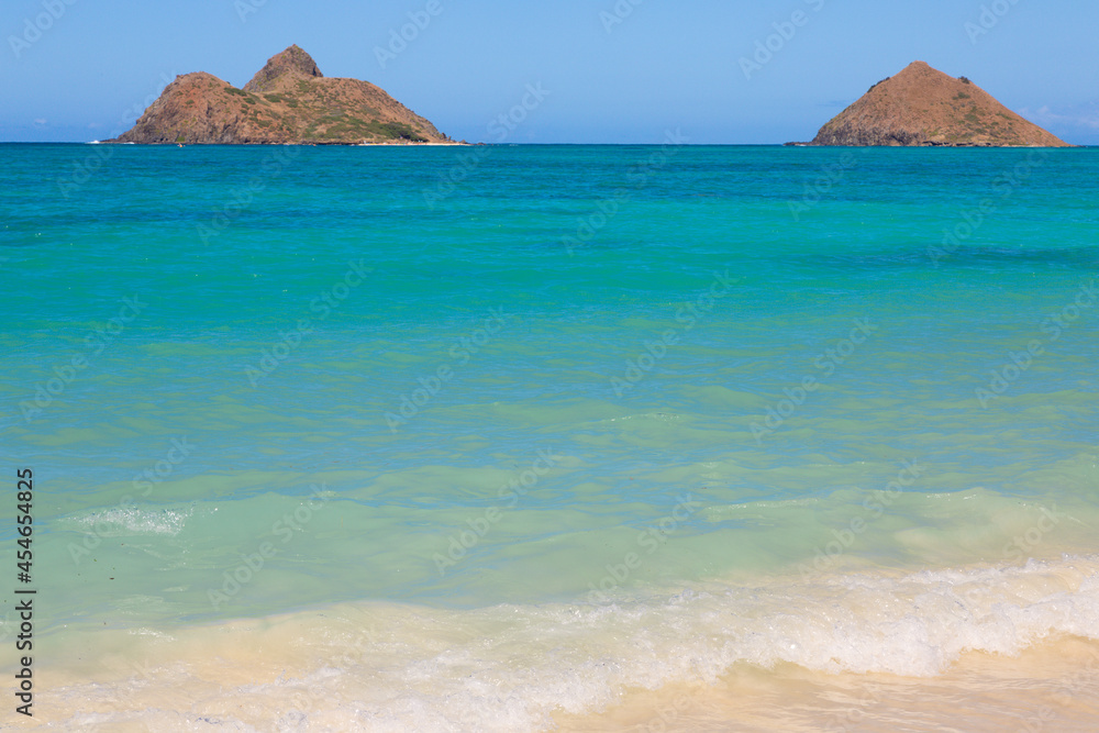 Fototapeta premium Landscape view of the twin brown Mokolua islands