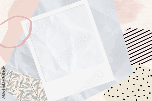Blank photo frame on scrapped paper background