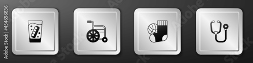 Set False jaw in glass, Wheelchair, Socks and Stethoscope icon. Silver square button. Vector