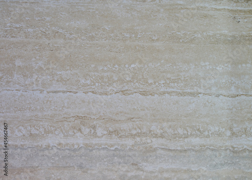 Mosaico decorativo con textura rugosa de color beige ideal para pisos y paredes