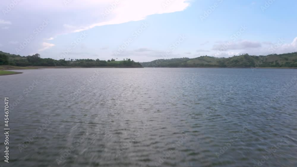 Flying Low Presa de Taveras, One of the biggest dams in Dominican Republic, Aerial Forward Flying Low Presa de Taveras, One of the biggest dams in Dominican Republic, Aerial Forward
