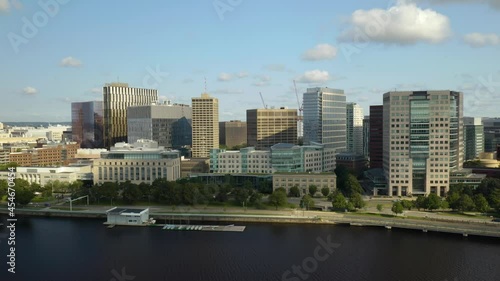 Cambridge, Massachusetts Skyline on Beautiful Summer Day from Charles River. Aerial Drone Shot photo