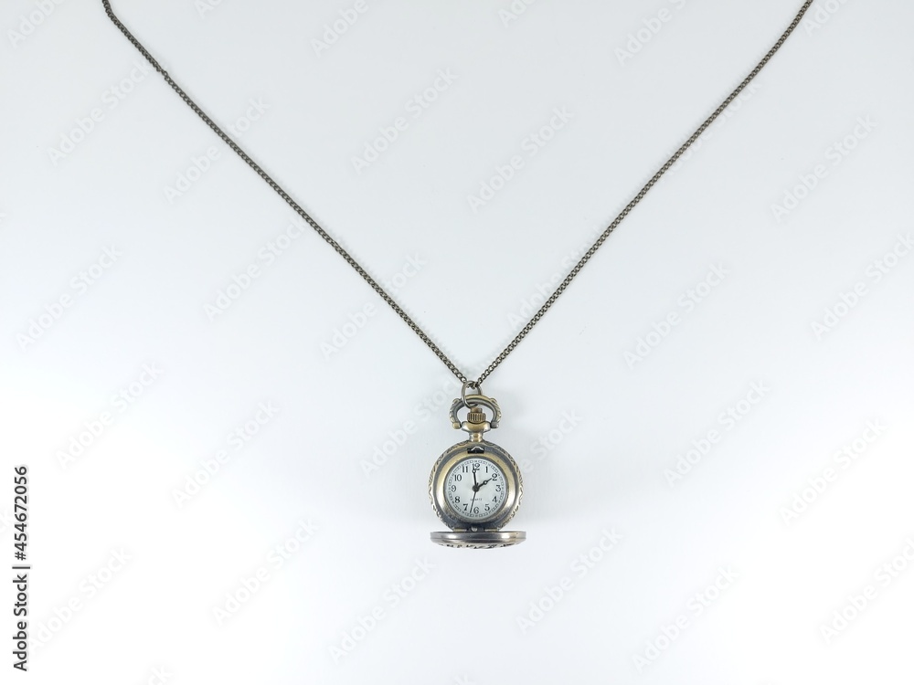 Fototapeta premium A pocket watch with chain on a white background.
