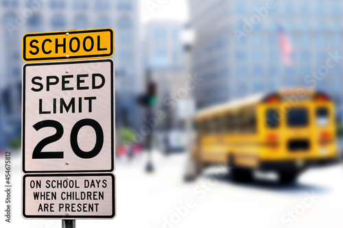 Traffic sign.  School zone  yellow warning board. Speed limit 20