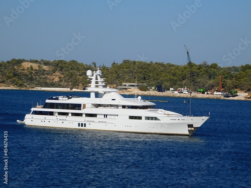 A luxury yacht near the coast of Vouliagmeni in Attica, Greece © Konstantinos