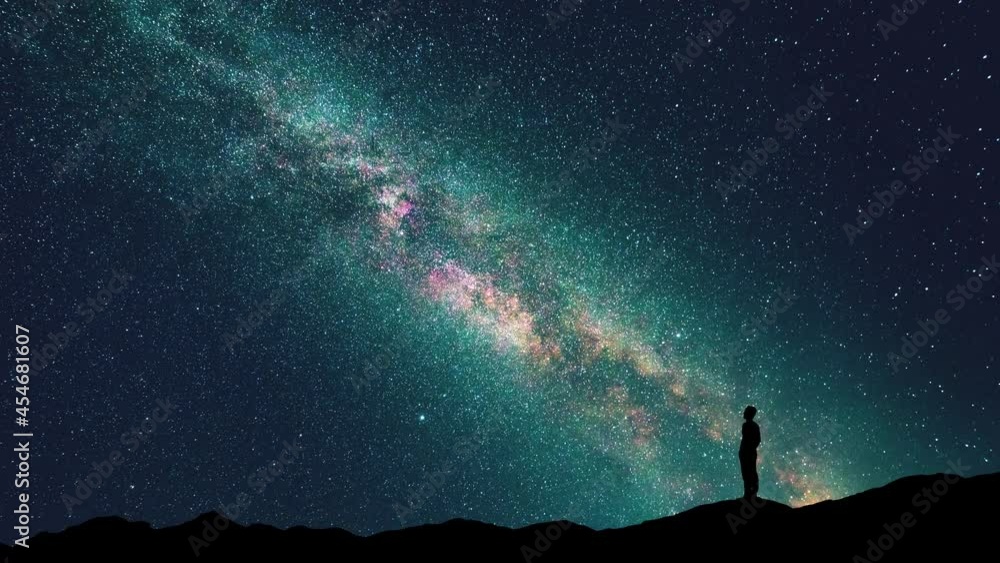 The man stand on a starry sky background. time lapse The man stand on a starry sky background. time lapse