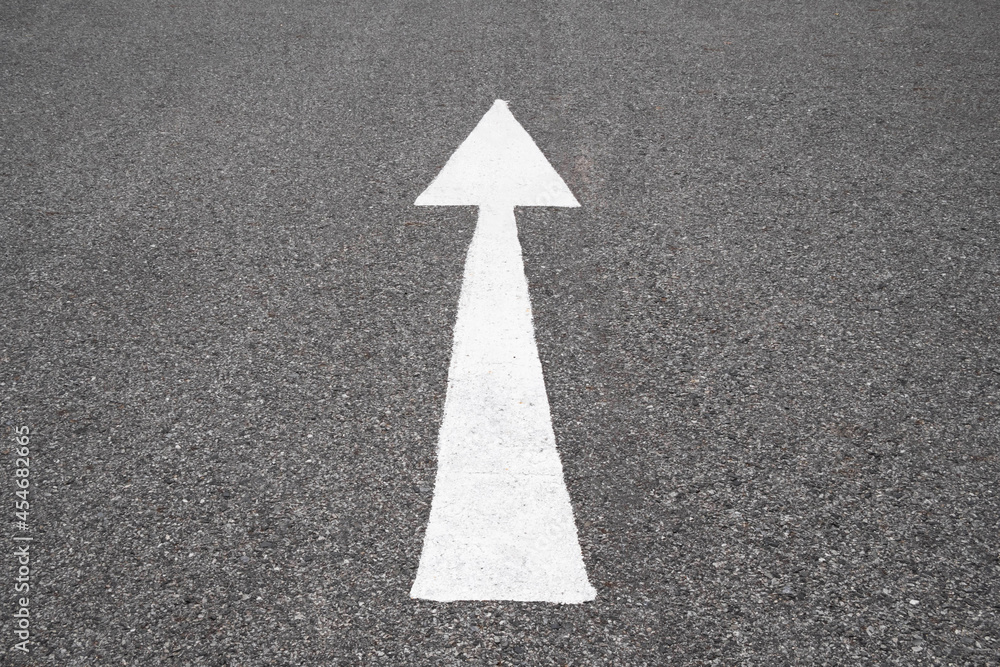 White arrow symbol Forward sign on the road White arrow symbol Forward sign on the road