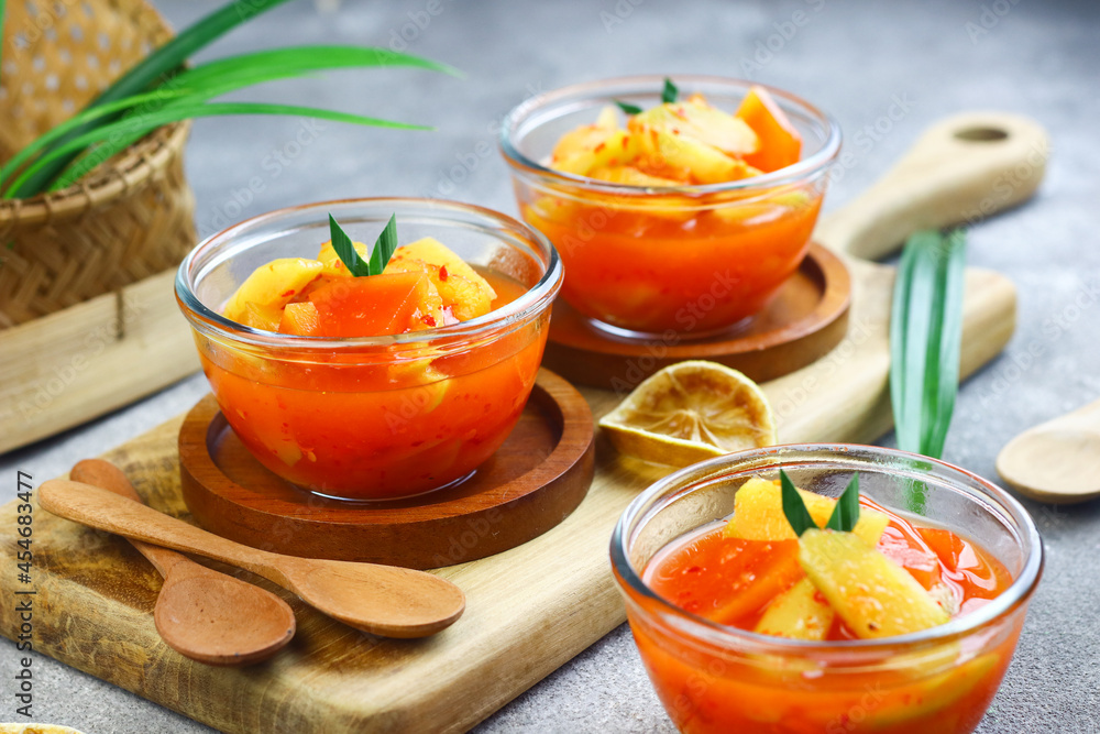 Asinan Buah or Indonesian pickled mixed fruits, spicy sweet and sour taste. Asinan Buah or Indonesian pickled mixed fruits, spicy sweet and sour taste.