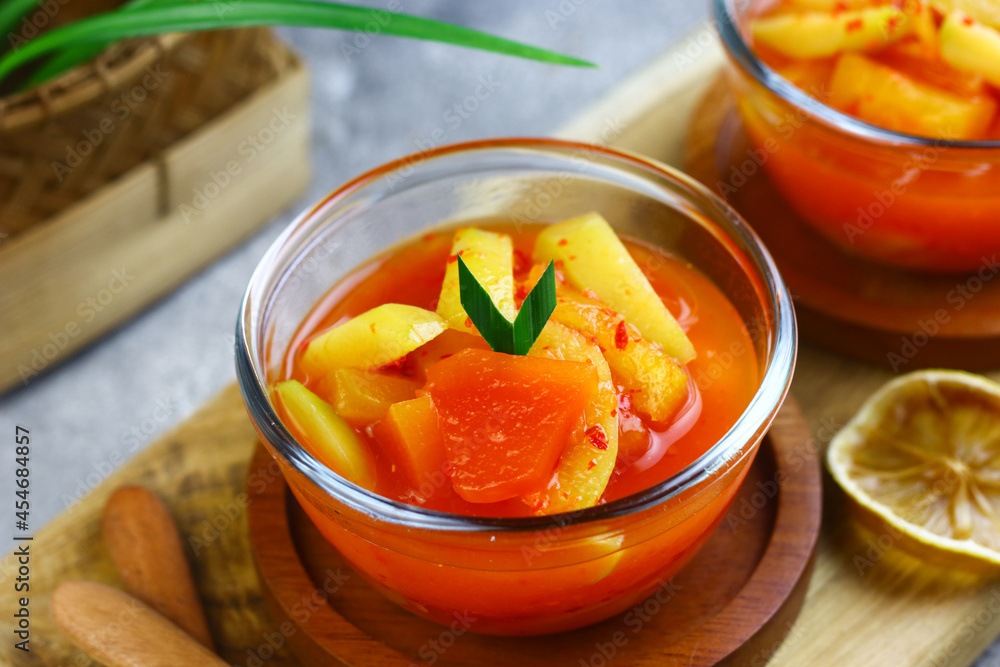Asinan Buah or Indonesian pickled mixed fruits, spicy sweet and sour taste. Asinan Buah or Indonesian pickled mixed fruits, spicy sweet and sour taste.