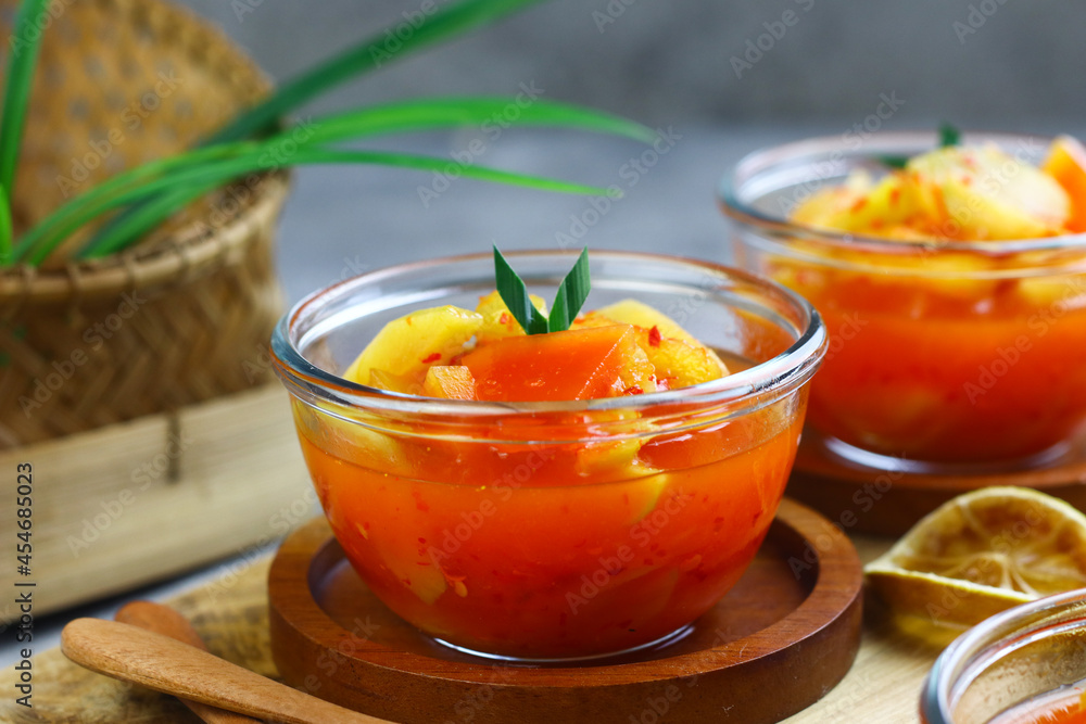 Asinan Buah or Indonesian pickled mixed fruits, spicy sweet and sour taste. Asinan Buah or Indonesian pickled mixed fruits, spicy sweet and sour taste.