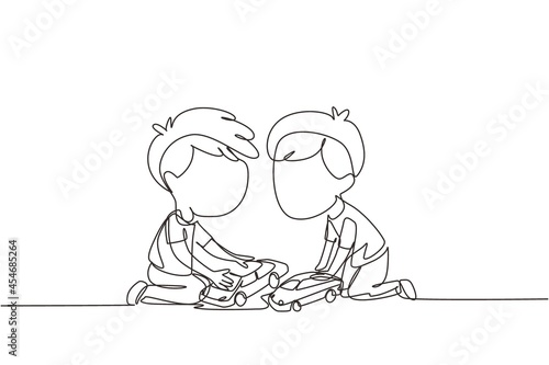 Single one line drawing two cute boys playing with their toys cars. Boy shows his toy cars to his friend. Happy kids playing together. Modern continuous line draw design graphic vector illustration