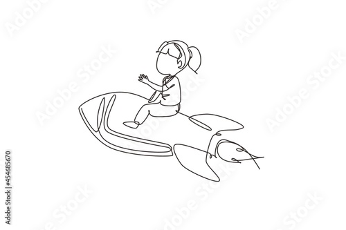 Single one line drawing happy girl is sitting on flying rocket. Preschool kid. Children sitting on rocket. Back to school. Educational concept. Continuous line draw design graphic vector illustration