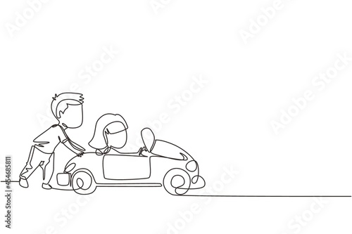 Continuous one line drawing a boy is pushing his friend's car in the road. Boy and girl play with big toy car together. Kids having fun with at backyard. Single line design vector graphic illustration