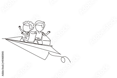 Single one line drawing happy two little boys flying on paper plane. Kids flying on paper airplane together. Children back to school concept. Continuous line draw design graphic vector illustration