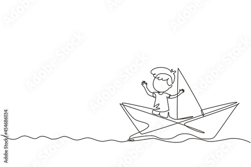 Continuous one line drawing cute smiling little boy sailing on paper boat. Happy smiling kid having fun and playing sailor in imaginary world. Single line draw design vector graphic illustration