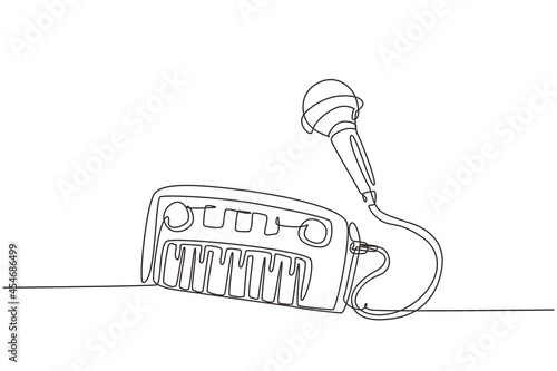 Continuous one line drawing electrical toy piano and microphone. Kids musical piano electronic piano keyboard toy musical instrument toy with microphone for boys girls. Single line draw design vector