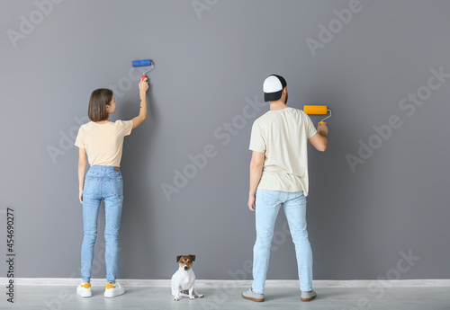 Young couple with cute dog ...