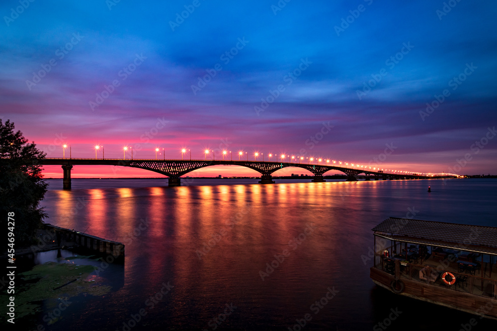 Night river before beautiful sunrise. Light on bridge. Night river before beautiful sunrise. Light on bridge.