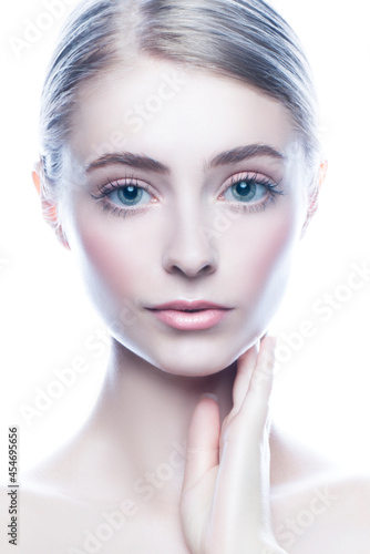 Cute girl beauty face of young adult model woman with perfect skin. Natural makeup. Skincare facial treatment concept