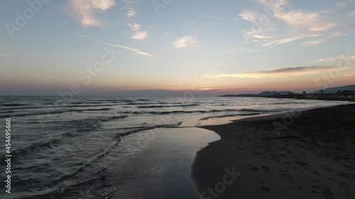 Wallpaper Mural Aerial shot hi speed sport fpv drone flight over amazing nature endless seascape. Beautiful summer sunset on a sandy beach. Torontodigital.ca