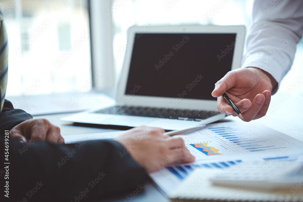 business people photo The feasibility of the project is being analyzed. with documents placed on the table and laptop business people photo The feasibility of the project is being analyzed. with documents placed on the table and laptop