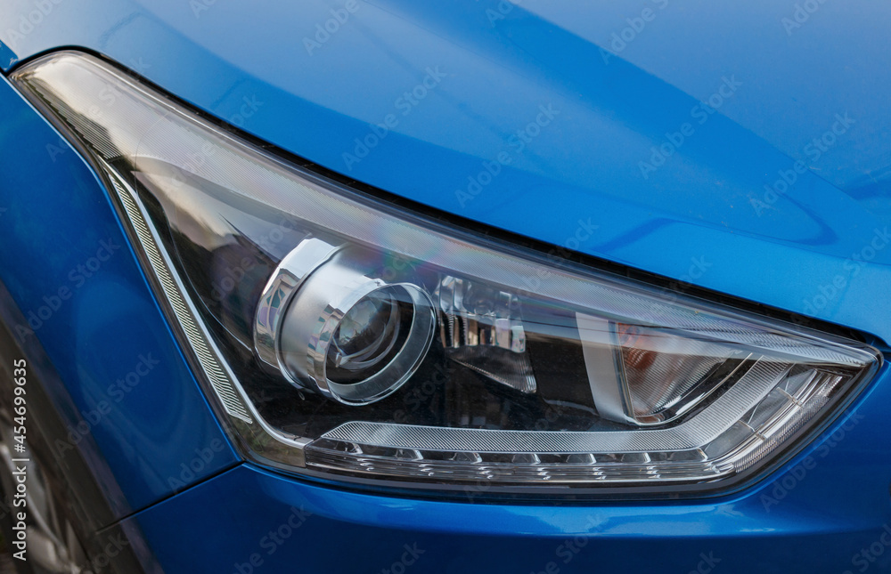 Lighting devices of a passenger car in close-up. fuzzy focus