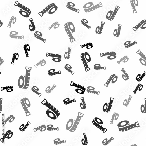 Black Measuring tape icon isolated seamless pattern on white background. Tape measure. Vector