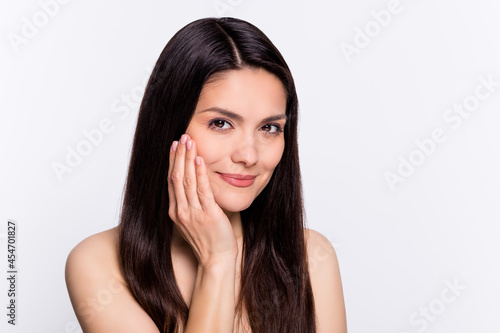 Photo portrait brunette woman smiling touching silky skin after bath isolated white color background copyspace