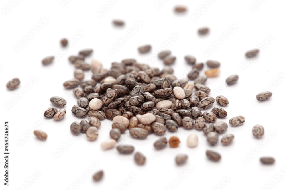 Micro close-up and details of Organic Indian organic chia seed (salvia hispanica ) isolated over white background. Micro close-up and details of Organic Indian organic chia seed (salvia hispanica ) isolated over white background.
