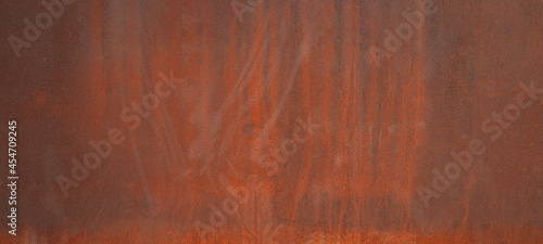 Grunge rusty orange brown metal corten steel stone background texture banner panorama