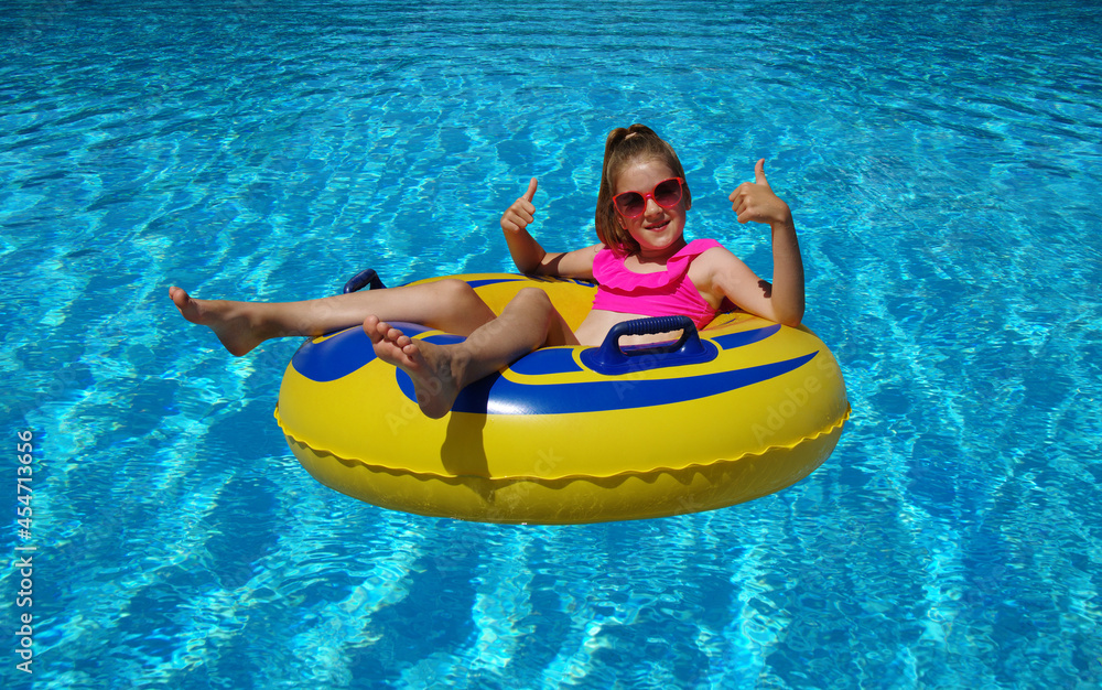 Little girl with inflatable ring