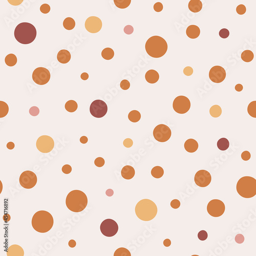 Seamless pattern with boho dots in terracotta colors. Neutral nursery art design for decoration, bohemian printing for fabric, wall art. Hand drawn vector illustration.