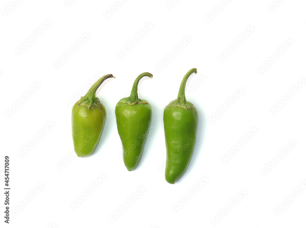 Three Green Chilies Isolated on White Background Three Green Chilies Isolated on White Background